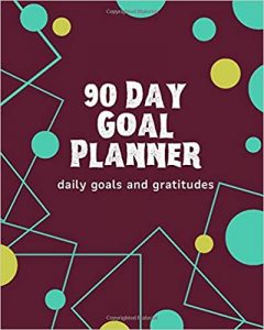 90 day goal planner - purple background with teal and green bubbles and geometric shapes