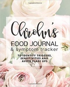 Crohn's food journal with pink peonies in the background